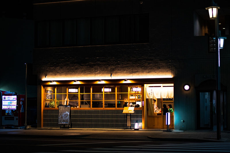 Cozy Japanese restaurant illuminated at night in Nagoya City, Aichi, Japan.